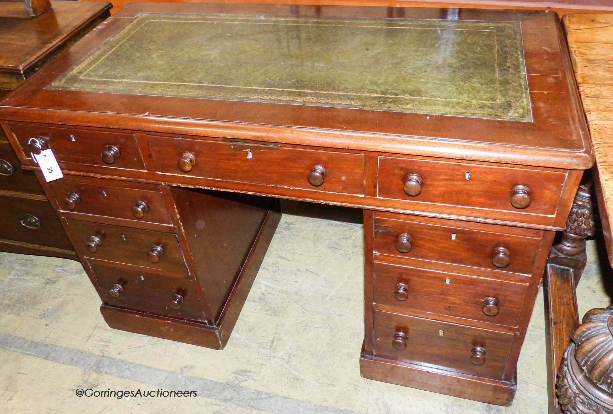 A Victorian mahogany pedestal desk, length 115cm, depth 61cm, height 79cm